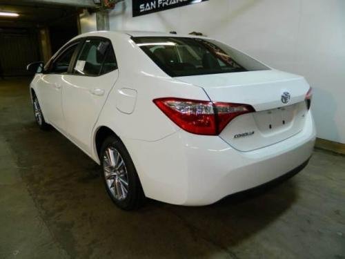 Photo of a 2015 Toyota Corolla in Super White (paint color code 040)