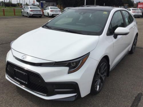 Photo of a 2021-2022 Toyota Corolla in Black Sand Pearl on Super White (paint color code 2NR)