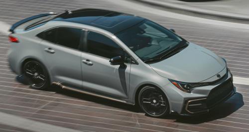 Photo of a 2021-2022 Toyota Corolla in Black Sand Pearl on Cement (paint color code 2QS)