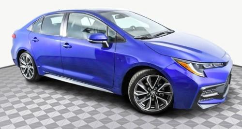 Photo of a 2021-2022 Toyota Corolla in Black Sand Pearl on Blue Crush Metallic (paint color code 2TT)