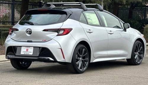 Photo of a 2020-2025 Toyota Corolla in Midnight Black on Classic Silver Metallic (paint color code 2UF)