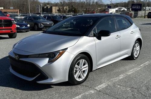 Photo of a 2020-2025 Toyota Corolla in Midnight Black on Classic Silver Metallic (paint color code 2UF)