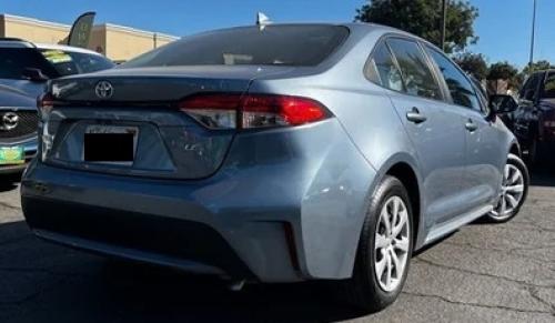 Photo of a 2021-2022 Toyota Corolla in Black Sand Pearl on Celestite (paint color code 2UP)