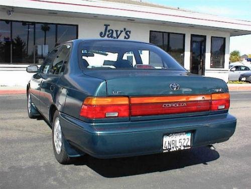 Photo of a 1994 Toyota Corolla in Dark Teal Metallic (paint color code 747)