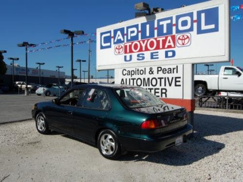 Photo of a 1999 Toyota Corolla in Dark Emerald Green Pearl (paint color code 6M1)
