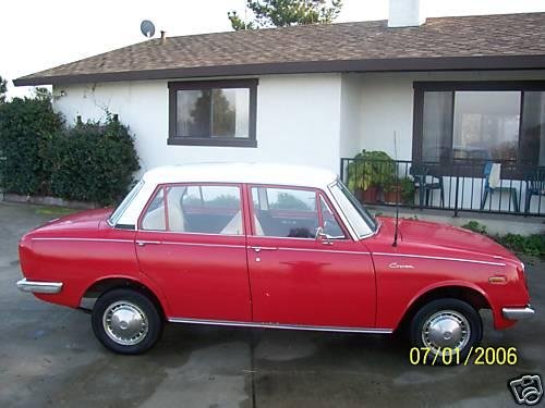 Photo of a 1966-1969 Toyota Corona in Solar Red (paint color code T1297