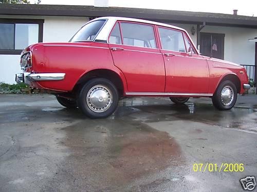 Photo of a 1966-1969 Toyota Corona in Solar Red (paint color code T1297
