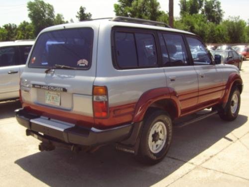 Photo of a 1992-1993 Toyota Land Cruiser in Silver Metallic on Medium Red Pearl (paint color code 20R)