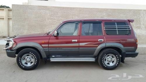 Photo of a 1994 Toyota Land Cruiser in Medium Red Pearl on Blue Slate Metallic (paint color code 26W)