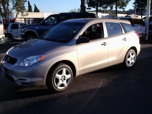 Photo of a 2003 Toyota Matrix in Desert Sand Mica (paint color code 4Q2)