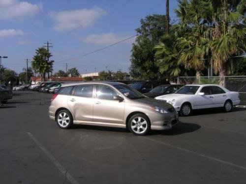 Photo of a 2003 Toyota Matrix in Desert Sand Mica (paint color code 4Q2)
