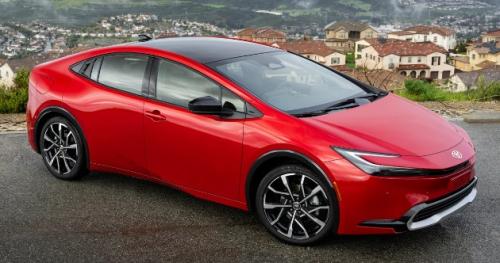 Photo of a 2023-2024 Toyota Prius in Supersonic Red (paint color code 3U5)