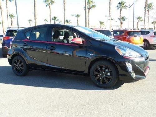 Photo of a 2016 Toyota Prius c in Black Sand Pearl on Cherry Pearl (paint color code 209C
