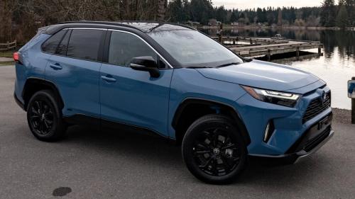 Photo of a 2022-2024 Toyota RAV4 in Midnight Black Metallic on Cavalry Blue (paint color code 2VV)