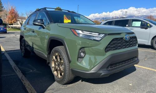 Photo of a 2024-2025 Toyota RAV4 in Midnight Black Metallic on Army Green (paint color code M02)