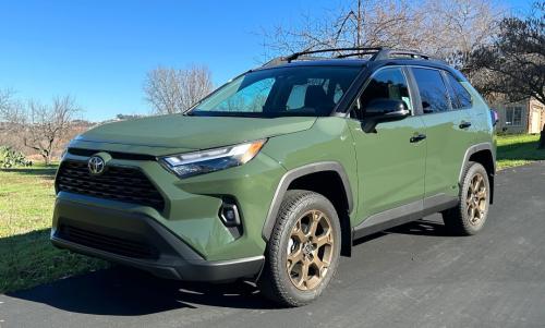 Photo of a 2024-2025 Toyota RAV4 in Midnight Black Metallic on Army Green (paint color code M02)