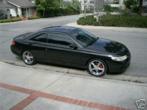 Photo of a 2000-2003 Toyota Solara in Black Sand Pearl (paint color code 209)