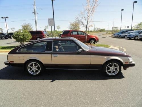 Photo of a 1981 Toyota Supra in Deep Red on Beige Metallic (paint color code 2A3)
