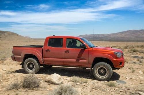 Photo of a 2015 Toyota Tacoma in Inferno (paint color code 4X0)