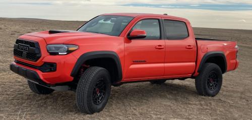 Photo of a 2023 Toyota Tacoma in Solar Octane (paint color code 4W5)