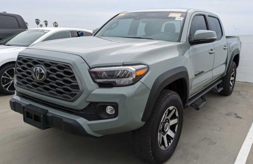 Photo of a 2023 Toyota Tacoma in Lunar Rock (paint color code 6X3)