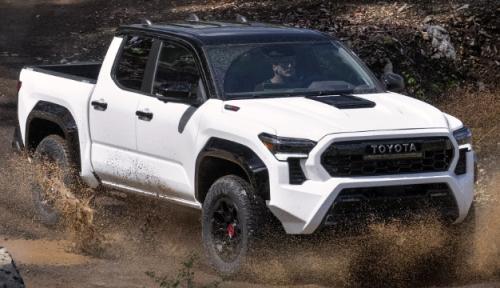 Photo of a 2024 Toyota Tacoma in Black on Ice Cap (paint color code 2MQ)