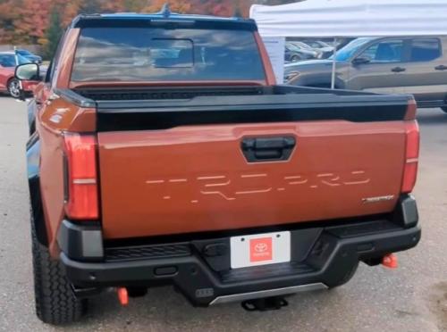 Photo of a 2024 Toyota Tacoma in Black on Terra (paint color code 2ZX)