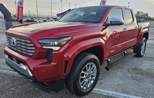 Photo of a 2024 Toyota Tacoma in Supersonic Red (paint color code 3U5)