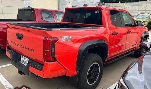 Photo of a 2024 Toyota Tacoma in Solar Octane (paint color code 4W5)