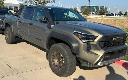 Photo of a 2024 Toyota Tacoma in Bronze Oxide (paint color code 6X1)