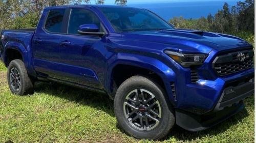 Photo of a 2024 Toyota Tacoma in Blue Crush Metallic (paint color code 8W7)