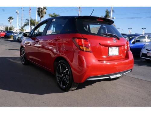 Photo of a 2016-2017 Toyota Yaris in Black Sand Pearl on Barcelona Red Metallic (paint color code 2NU)