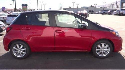 Photo of a 2016-2017 Toyota Yaris in Black Sand Pearl on Barcelona Red Metallic (paint color code 2NU)